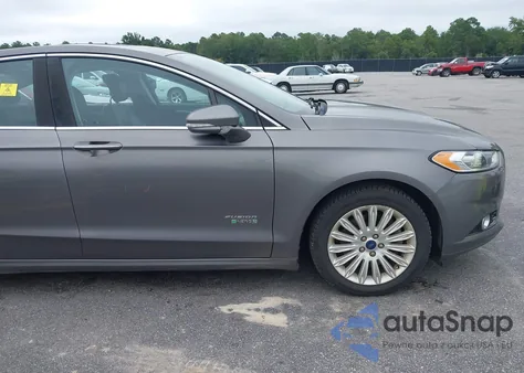 2013 Ford Fusion Energi Titanium z USA, uszkodzony, nr VIN 3FA6P0SU4DR285304